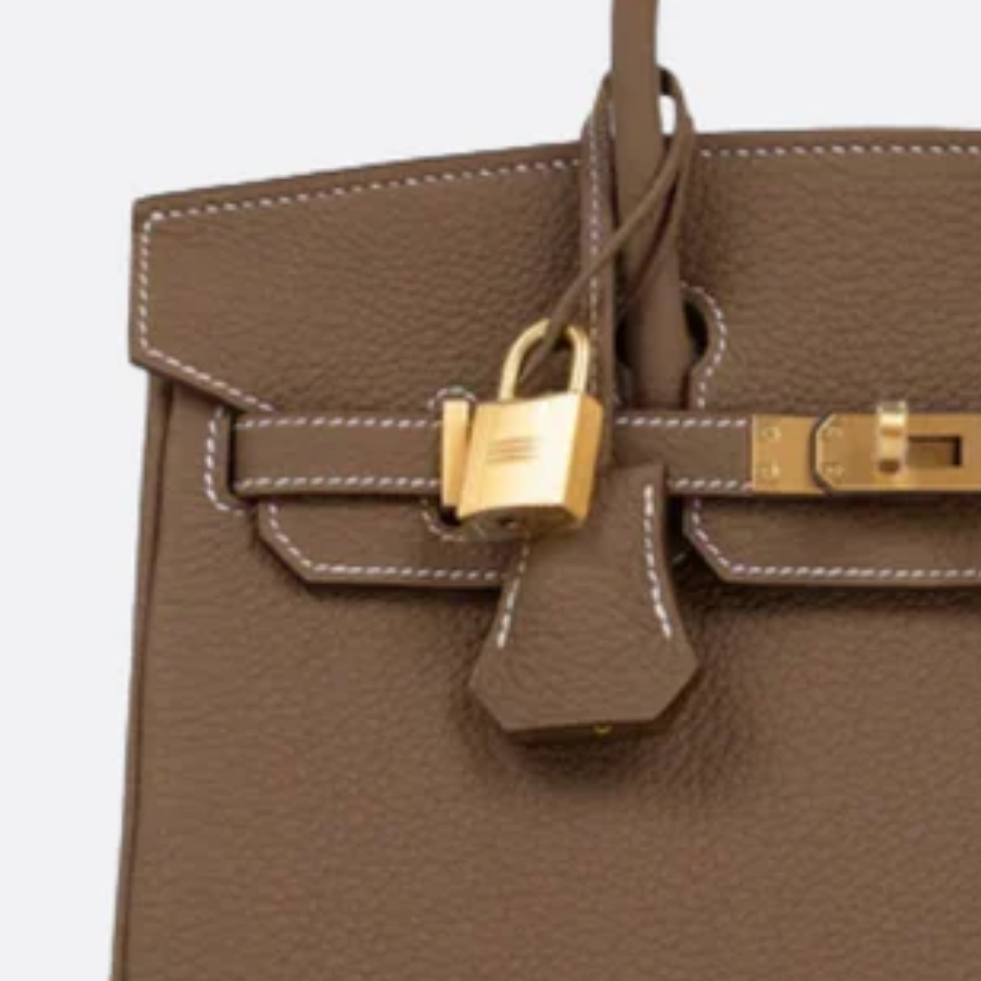 Bag 25 Brk HSS Cr / GryTr Made of Tg Leather with Brushed Gold Fittings